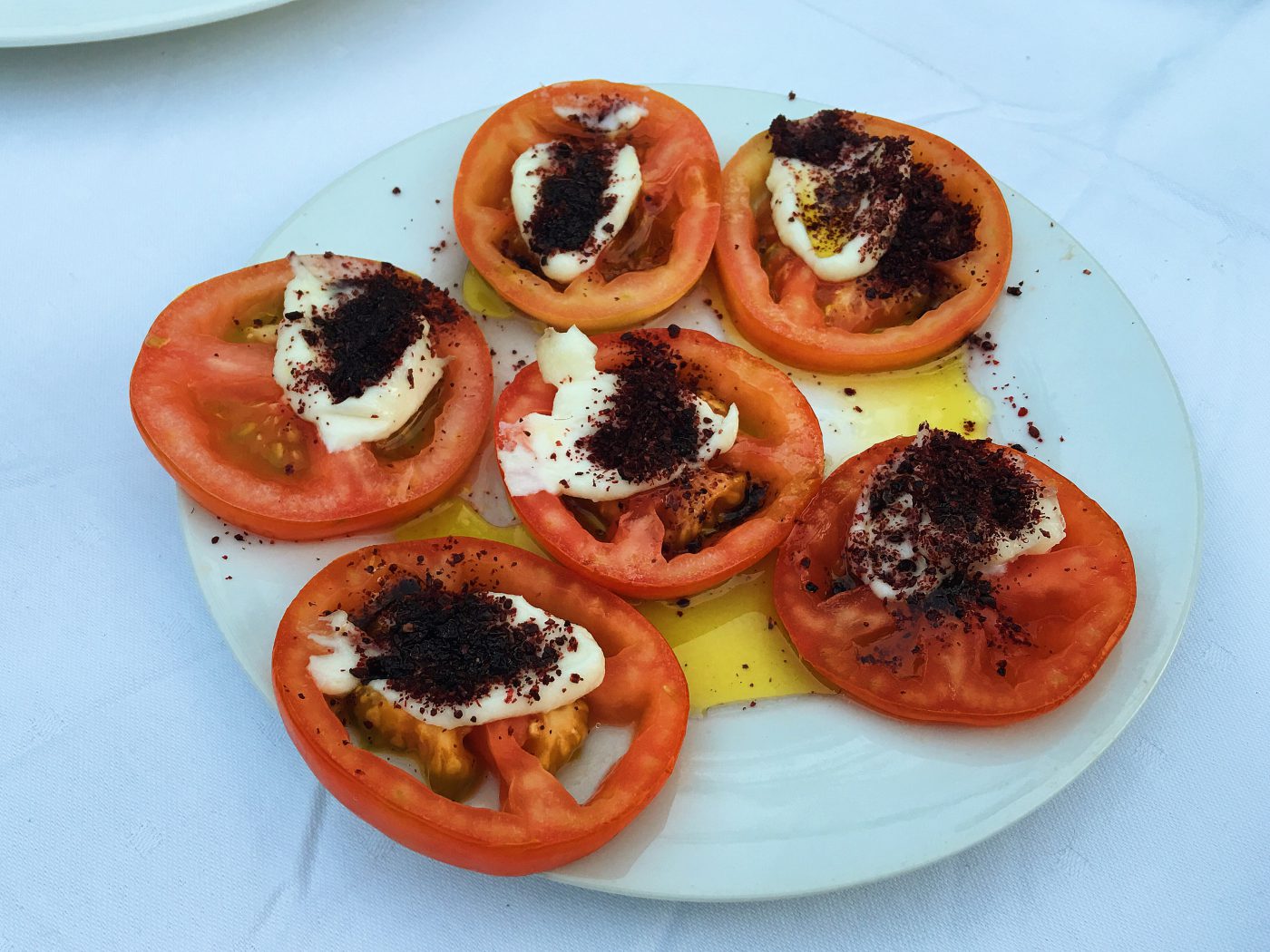 Fresh tomato with Tahini dressing