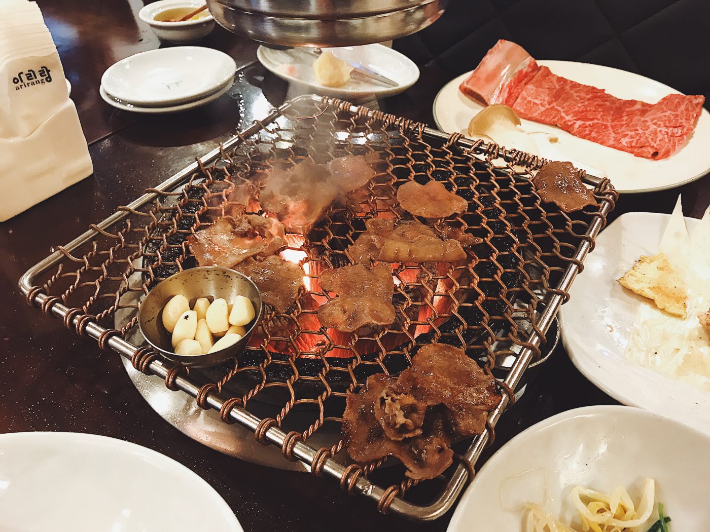 Ox tongue over charcoal grill at Arirang