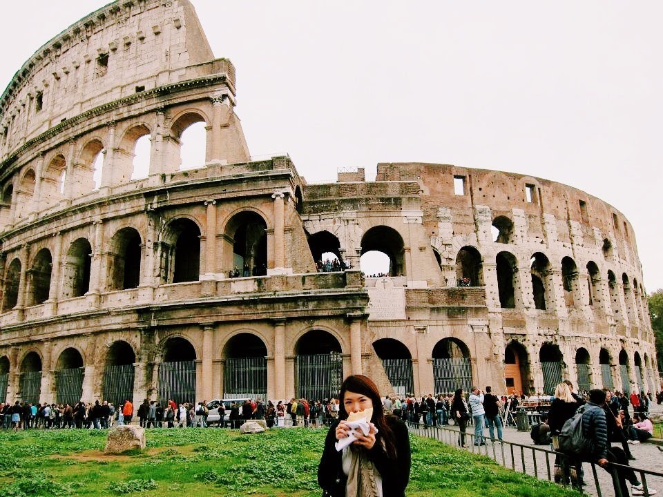 Eating in front of the Colosseum