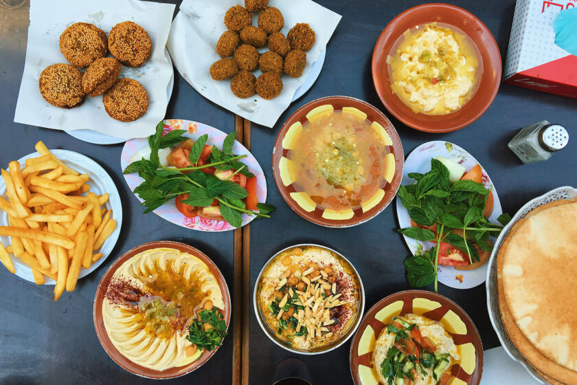 Hashem Restaurant - A spread of hummus, falafel, mutabal and ful medames in Amman